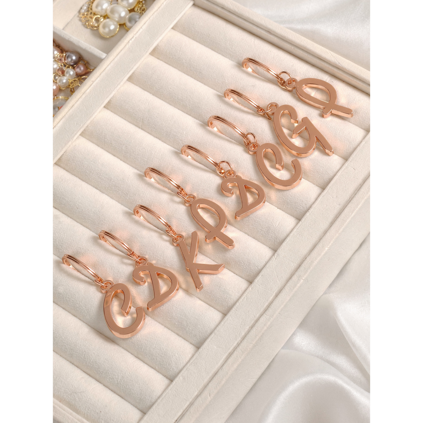 Llavero de letra "G" laminado en oro 18KL