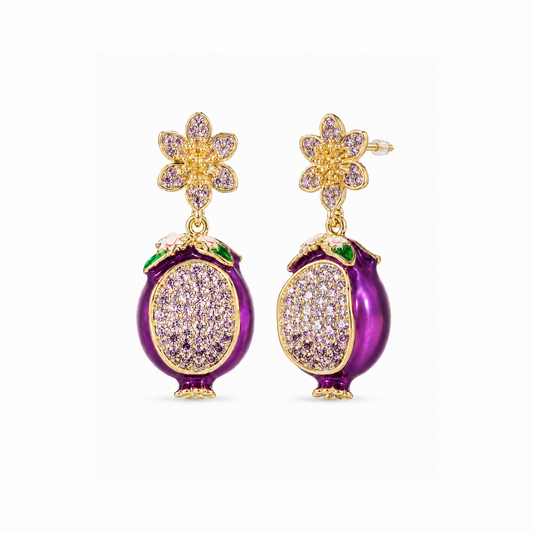 Aretes en oro 18KL y Swarovski